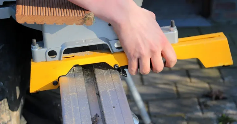 Circular saw mounted on an aluminum guide rail track for a straight cut