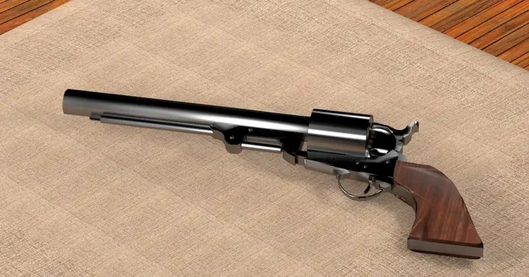 Wood pistol grip on a Colt-style revolver, hand-shaped from a walnut blank