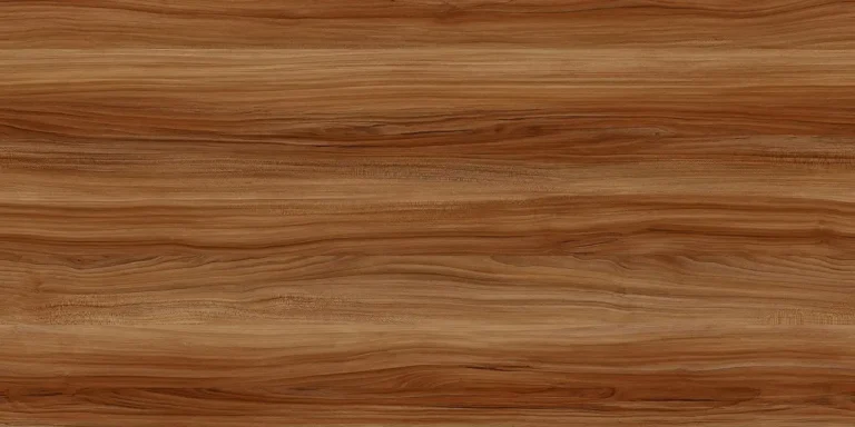 Three teak boards showing freshly cut golden-brown to weathered silvery-gray color change