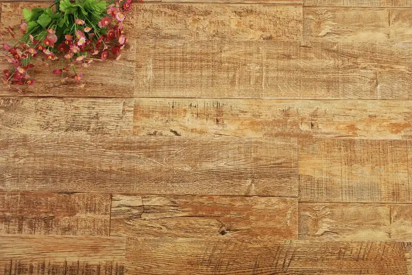 Modern living room with wide-plank engineered and solid wood flooring samples beside a statement floor.