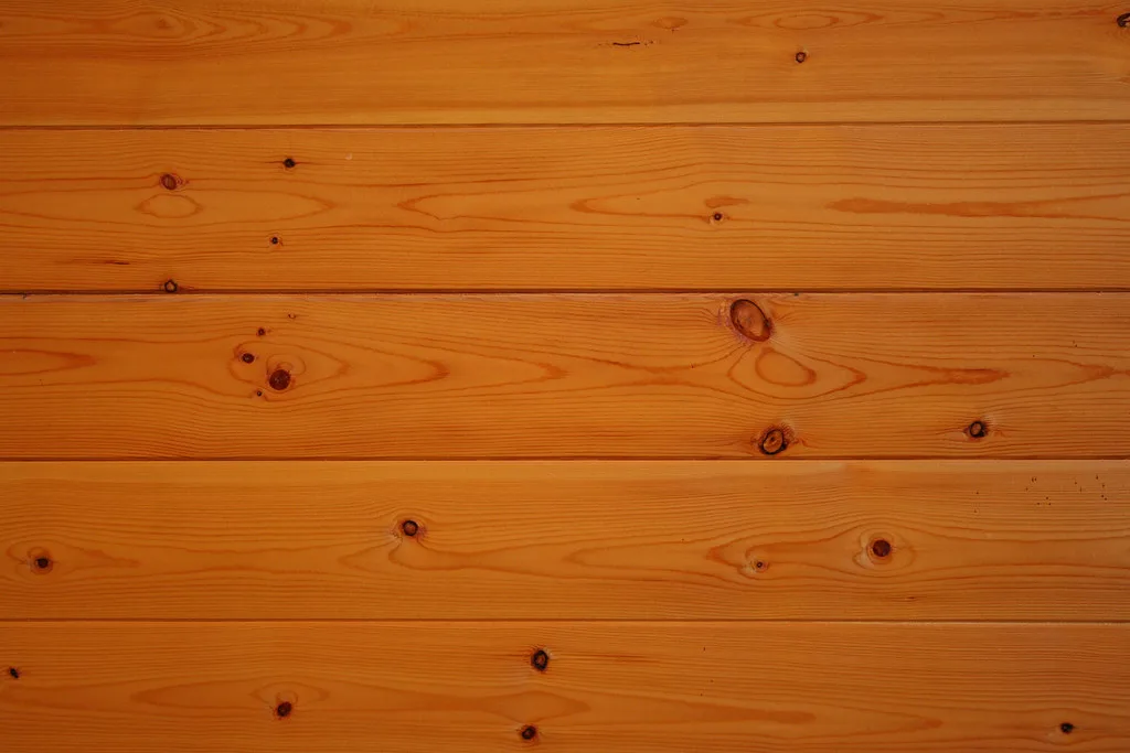 Hard maple and soft maple furniture pieces side by side in natural light, showing grain and finish differences
