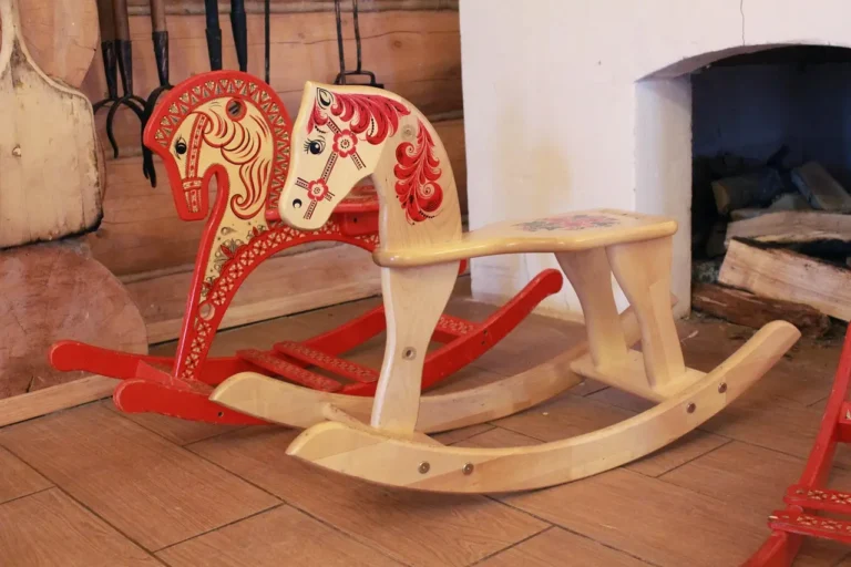 Workbench with a flat-sided rocking horse template and a carved heirloom rocking horse build