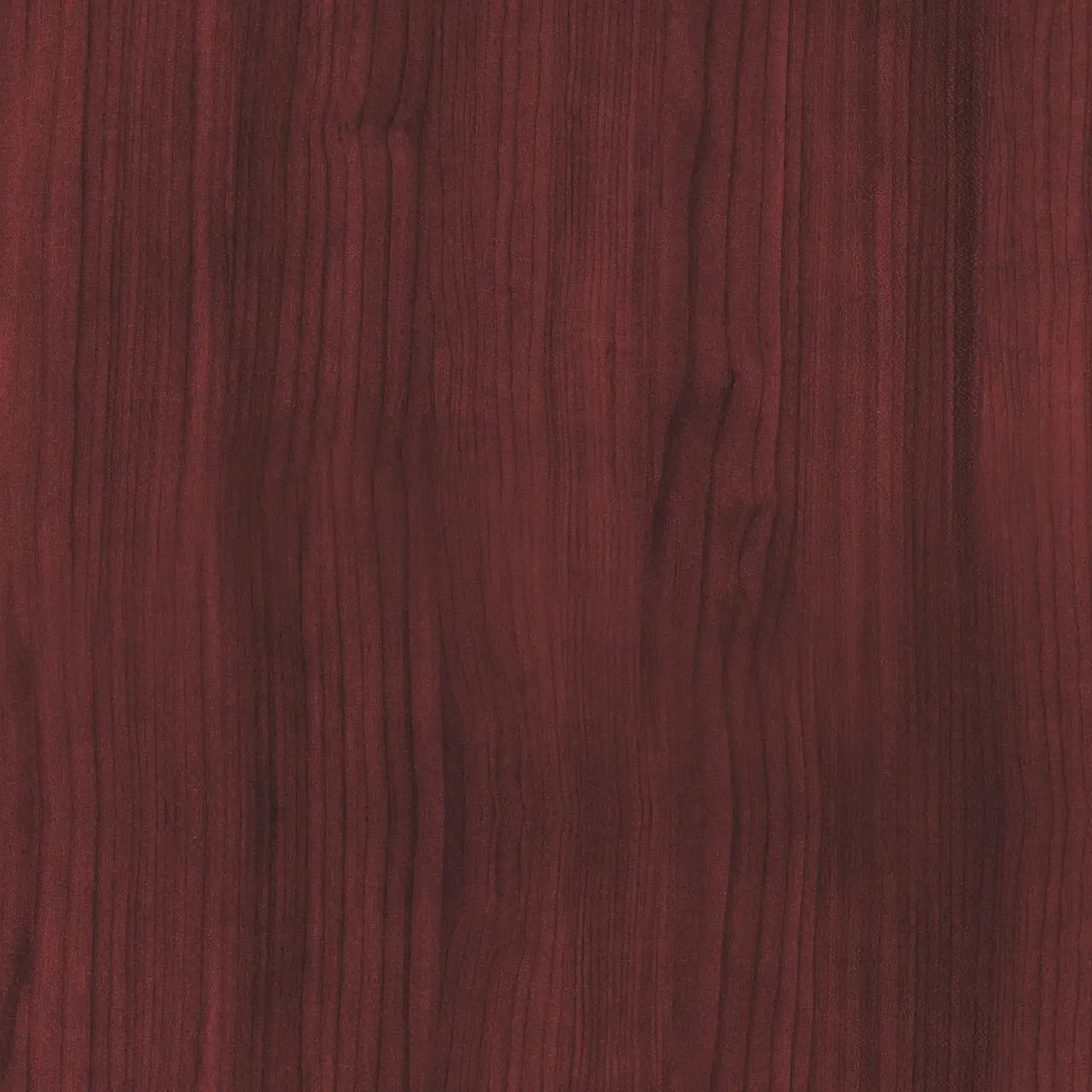 Mahogany wood samples on a workbench with a loupe and caliper in natural light