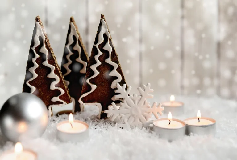 Finished wooden snowflake pattern on a workbench with ruler, pencil, clamps, and pine boards